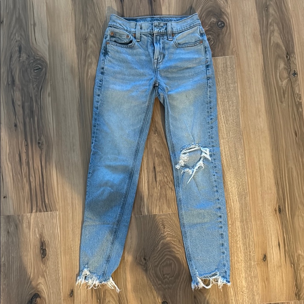 Women's Distressed Blue Jeans